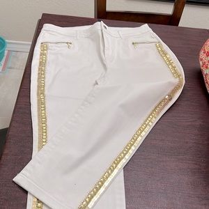 Chicos Black Label white jeans with gold bling down side of leg.